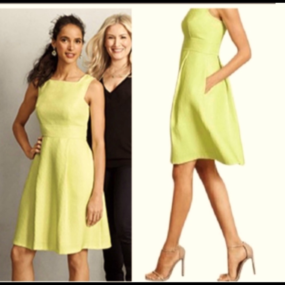 Size 4 Heidi Weisel little yellow dress with side pockets.